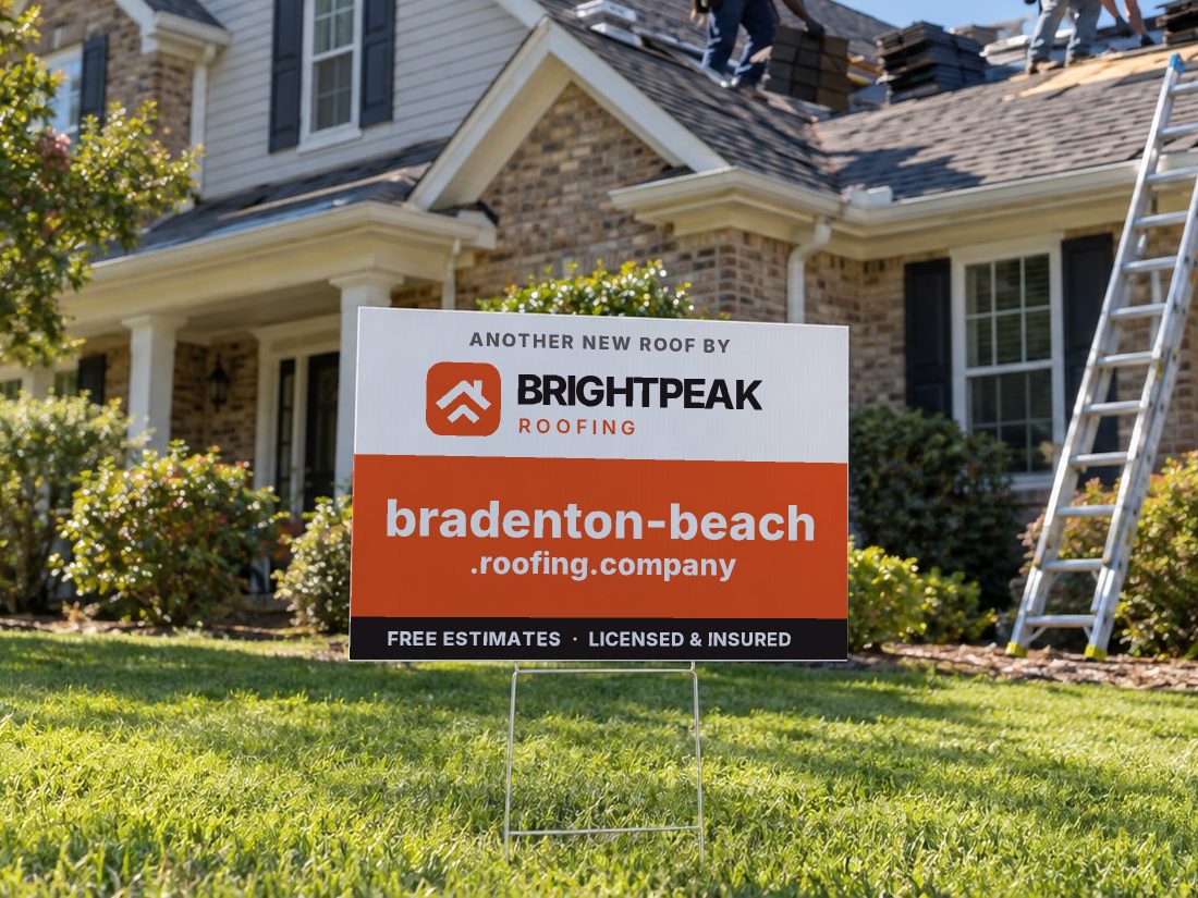 bradenton-beach.roofing.company on a yard sign in front of a house getting a new roof
